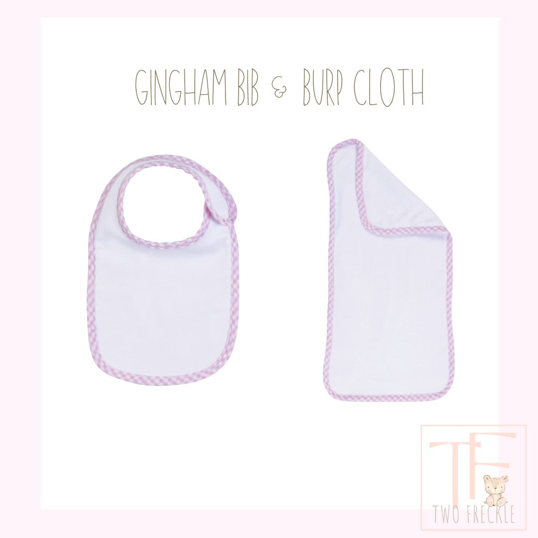 a baby bib and burp cloth are shown